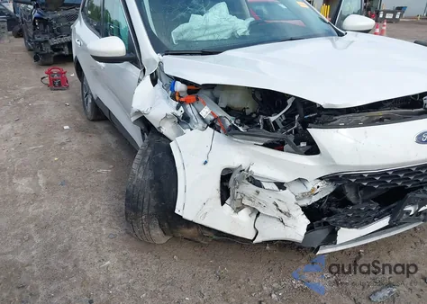 2021 Ford Escape Sel Hybrid z USA, uszkodzony, nr VIN 1FMCU9CZ7MUB16676